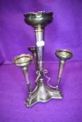 A silver plated Epergne having trumpet shaped vessels.