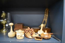 A mixture of treen items including trinket boxes with carved detailing, and other containers.