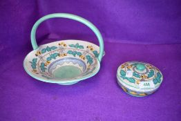 A Charlotte Rhead for Bursley ware basket and trinket dish with lid, both having pale grey ground