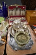 A variety of flat ware and a vintage canteen of cutlery.