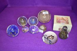 A selection of naturalistic designed paper weights including Hafod grange