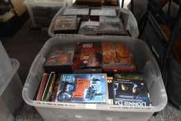 Two boxes of mixed interest DVDs.