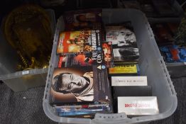 Two boxes of mixed interest DVDs.