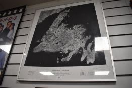 A framed and glaze satellite image of Canada.