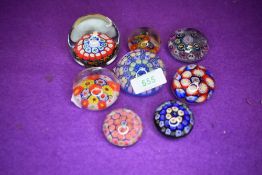 A selection of art glass paper weights in millefiori designs