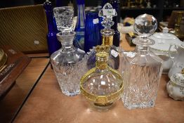 A selection of decanters including Remy Martin Baccarat cognac bottle in excellent condition