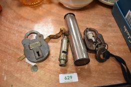 A vintage fairylite telescope, two padlocks a metropolitan whistle and smaller whistle.