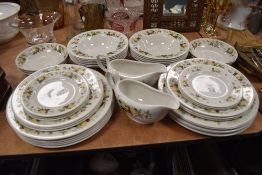 A selection of dinner and serving plates by Royal Doulton in the Miramont design