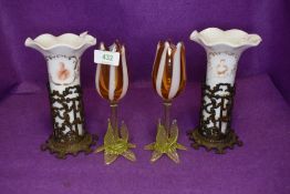 A pair of fluted vases having cast metal bases to hold them,Of royal interest,AF and a pair of