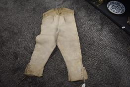 An antique pair of soft leather/suede jodhpurs,possibly of military interest.