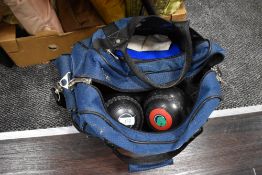 A bag of lawn bowls.
