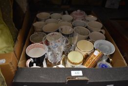 A box of mugs.