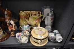 A Sadler tea pot and coffee pot having floral design and gilt detailing, a Windsor art ware tea