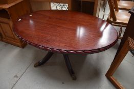A reproduction Regency style oval coffee table, width approx 120cm