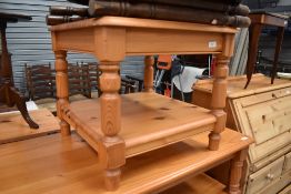 A pine coffee table, labelled Ducal, approx. 53cm x 53cm