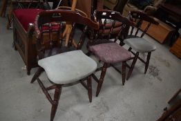 A set of three stained frame pub style dining chairs
