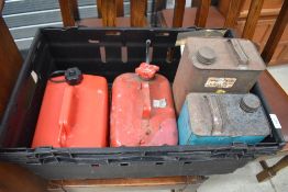A selection of oil and petrol cans