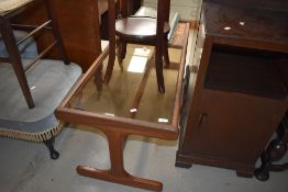 A vintage teak and part tile top coffee table, with partially smoked glaze section, approx. 120 x