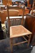A Victorian cane seated bedroom chair