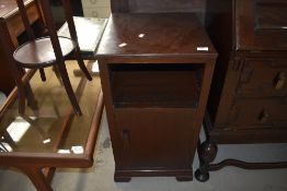 An early 20th Century oak bedside cabinet