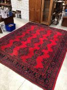 A large Turkish carpet square, approx 310cm x 385cm