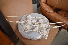 A pair of Victorian cast iron painted towel 'maids'