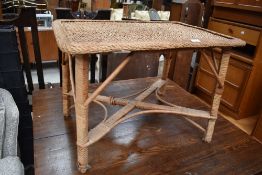 A vintage canework coffee table, approx. 73 x 53cm