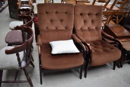 A pair of vintage scroll arm chairs, brown dralon