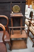 A traditional table top gong, oak occasional table and folding tea trolley