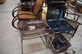 Two near matching chrome and perspex dining chairs, of early 1970's design
