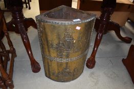 A vintage brass corner stick stand, ship decoration