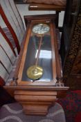 A 19th Century Vienna style wall clock having enamelled dial and labelled Waterbury clock Co. ,