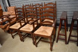 A set of six (four plus two) modern oak effect chairs having rush seats