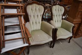 A pair of stained frame Continental style arm chairs with dralon upholstery