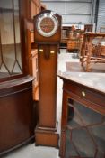 A mid 20th Century oak cased 'grandmother clock' having original movement present but been