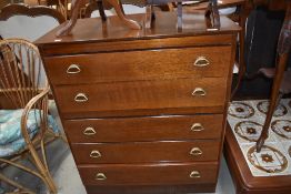 A mid 20th Century oak and ply bedroom chest of five long drawers, width approx. 79cm