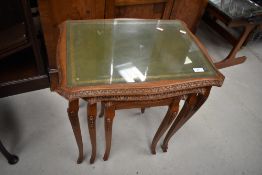 A late C20th stained frame nest trio tables