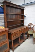 A reproduction oak dresser of nice quality, Titchmarsh and Goodwin or similar, width approx.