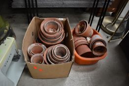A selection of clay plant pots
