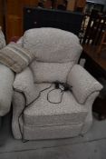 A modern electric recliner armchair