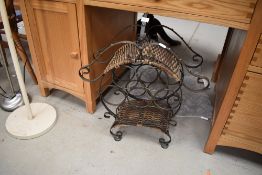 A modern metal and rattan effect wine rack