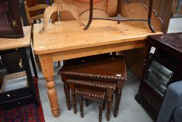 A natural pine kitchen table, with frieze drawer to end, turned legs, approx. 122cm x 90cm