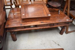 A modern Sheesham style coffee table, approx. 110 x 60cm