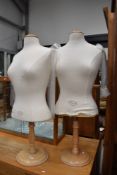 A pair of modern French dress makers dummies, labelled Vendome, on adjustable rubber wood bases