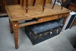 A rustic pine kitchen or side table, one drawer missing, on turned legs approx. 152 x 62cm