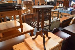An early 20th Century wine table, height approx. 59cm