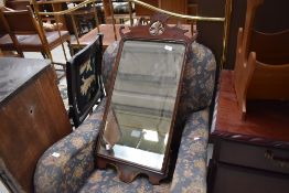 An early C20th mahogany Chippendale revival wall mirror