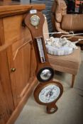 A late 19th or early 20th mahogany cased onion barometer