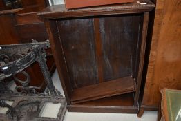A 1920's oak adjustable bookcase, approx w 73cm