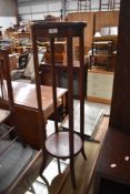 An Edwardian mahogany and inlay jardiniere stand, diameter approx. 28cm, height 99cm